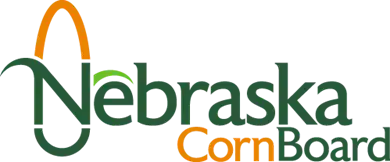 Nebraska Corn Board logo with green text, an orange corn graphic, and orange accents.